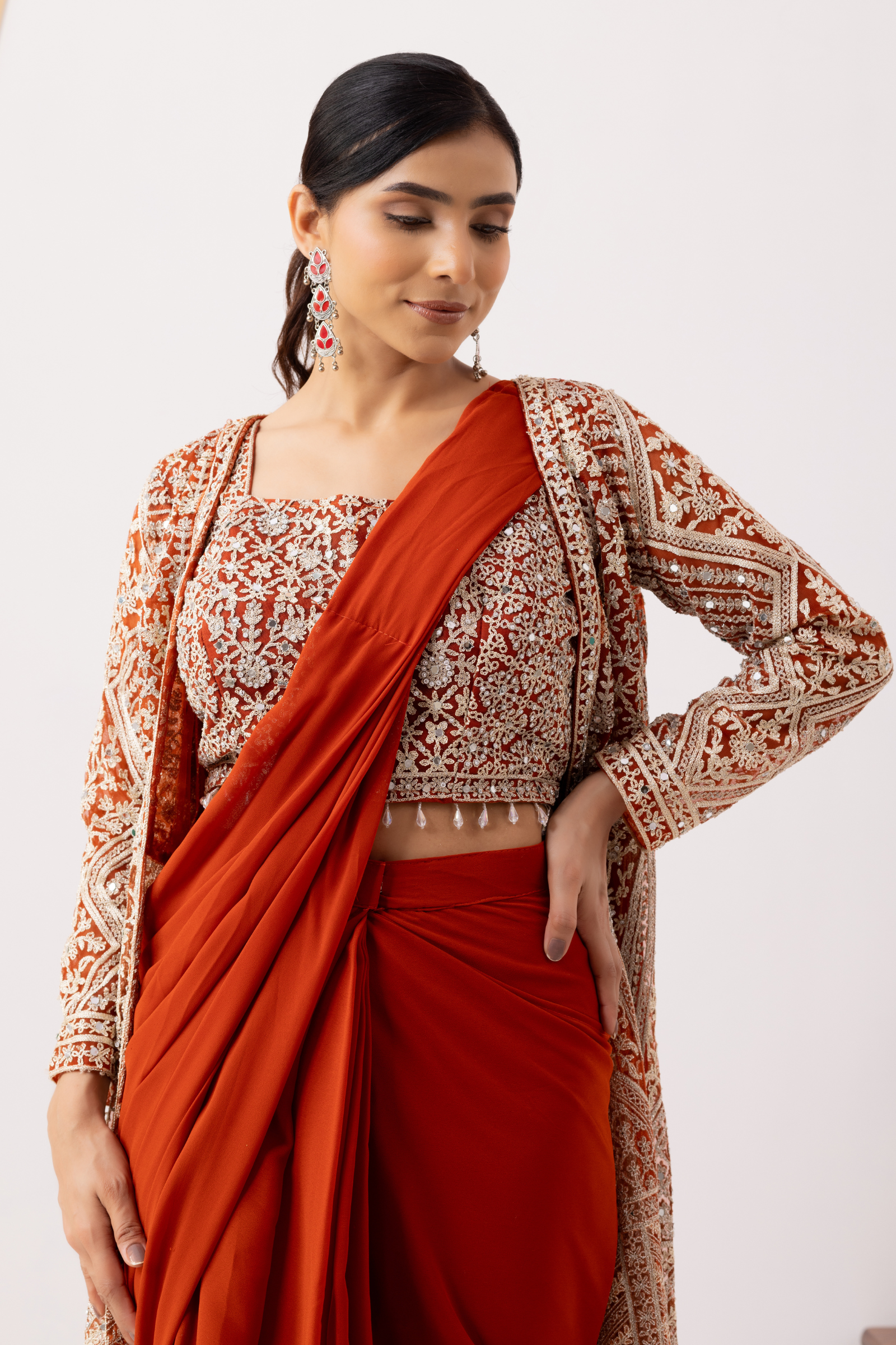 Rust Gold Draped Saree with Heavy Embroidered Shrug & Blouse