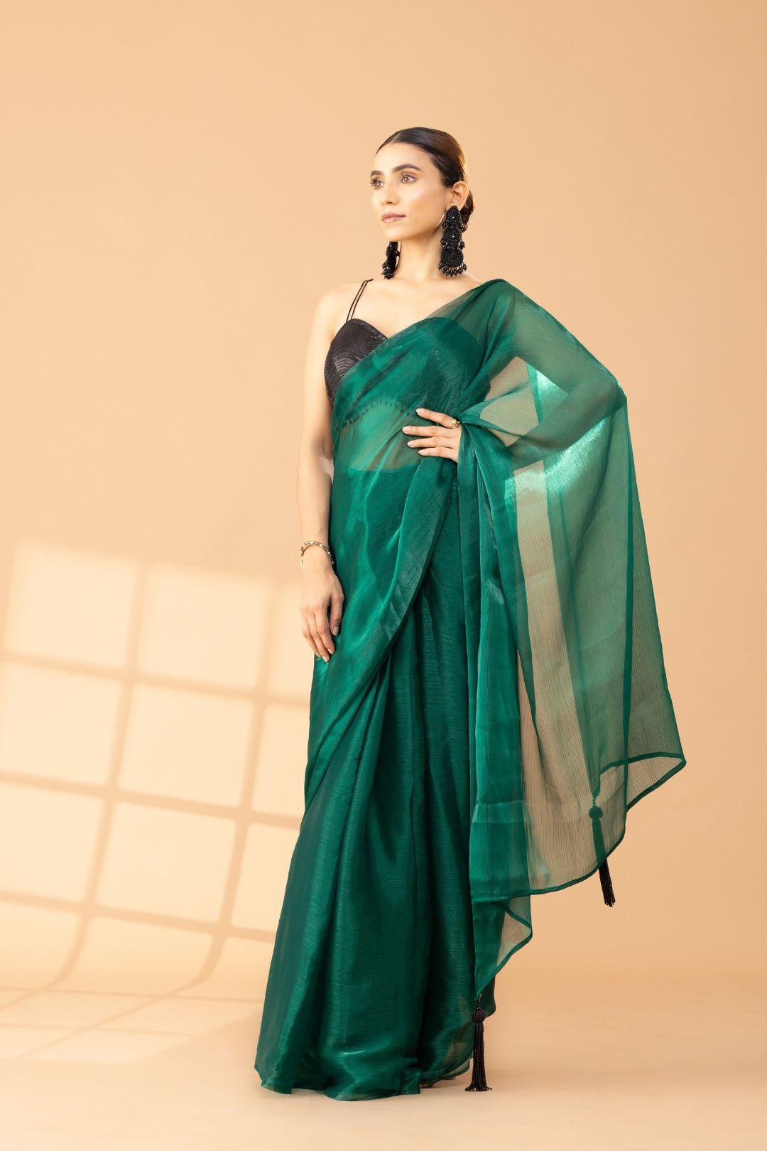 Rich Emerald Green Organza Chiffon Saree With Black Tassels