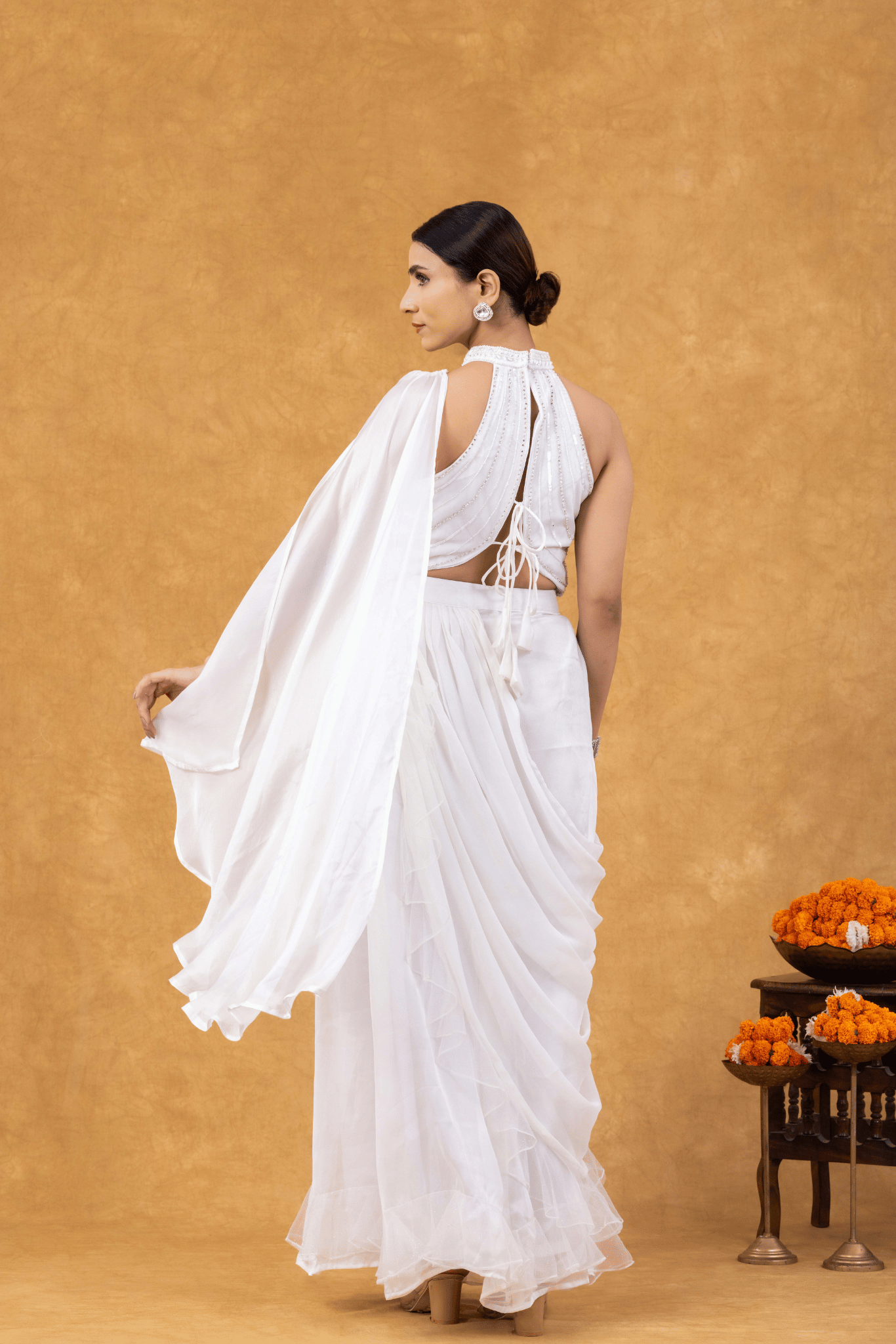 Ivory Ruffle Drape Saree with Embellished Halter Blouse
