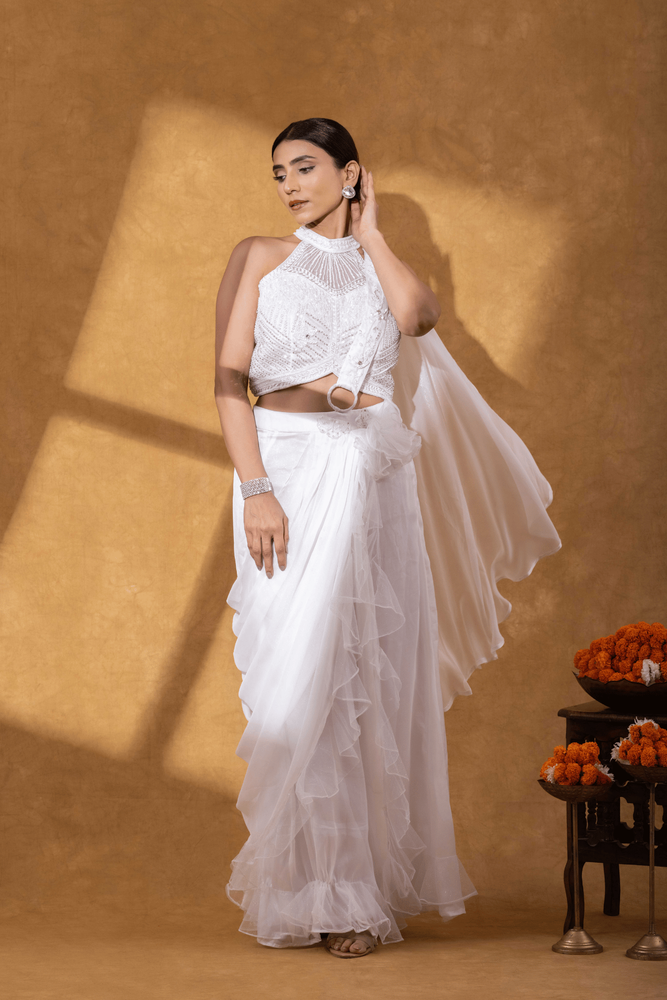 Ivory Ruffle Drape Saree with Embellished Halter Blouse