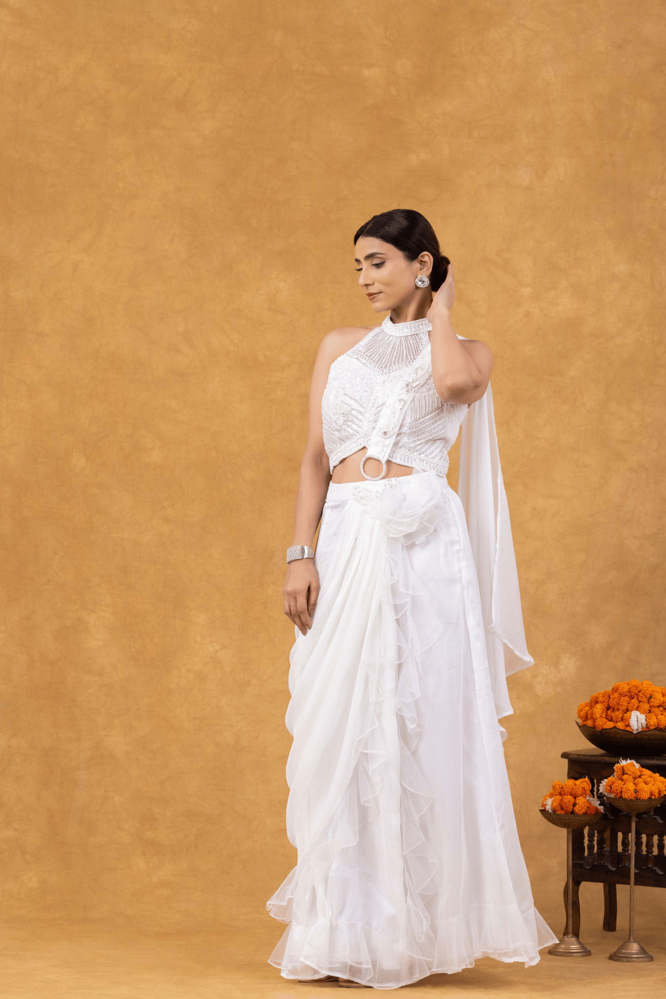Ivory Ruffle Drape Saree with Embellished Halter Blouse