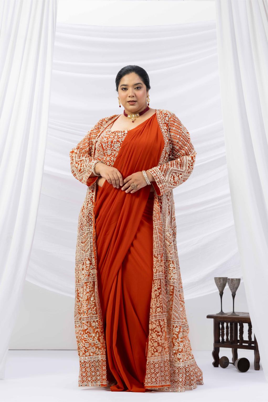 Rust Gold Draped Saree with Heavy Embroidered Shrug & Blouse