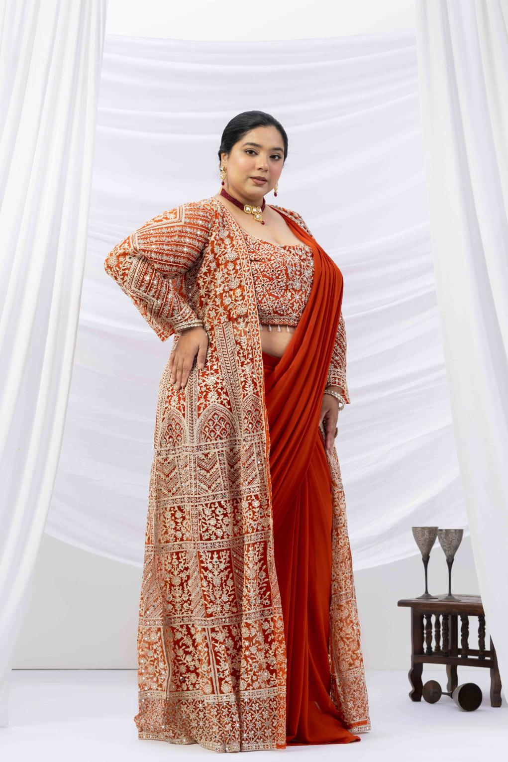 Rust Gold Draped Saree with Heavy Embroidered Shrug & Blouse