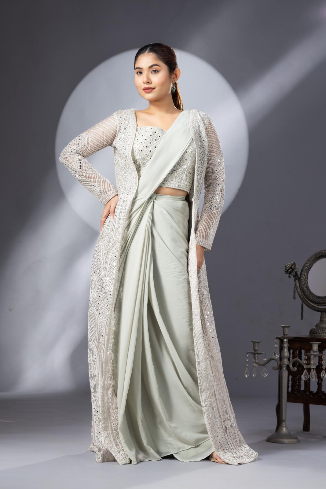 Pastel Green Draped Saree with Heavy Embroidered Shrug & Blouse