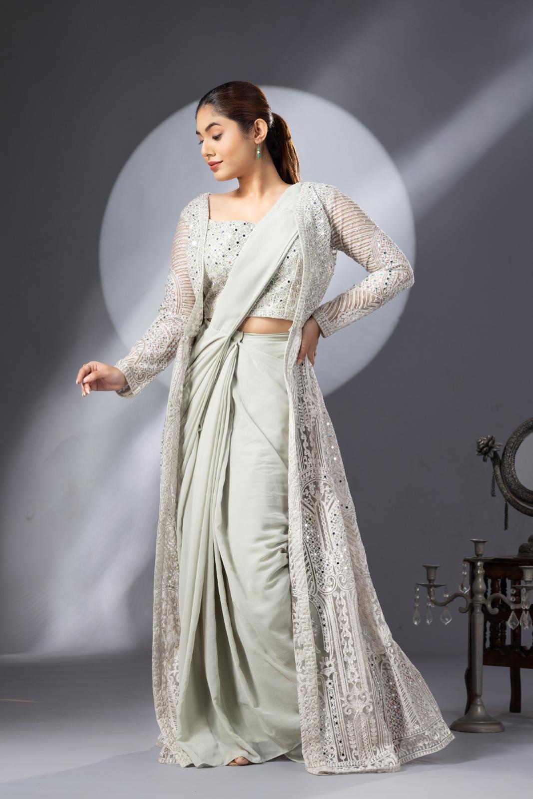 Pastel Green Draped Saree with Heavy Embroidered Shrug & Blouse