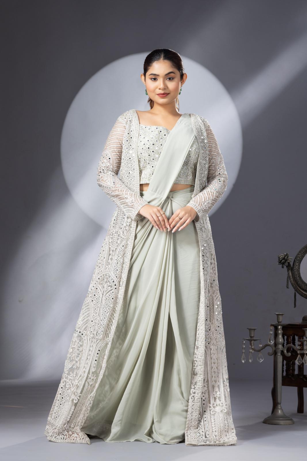 Pastel Green Draped Saree with Heavy Embroidered Shrug & Blouse