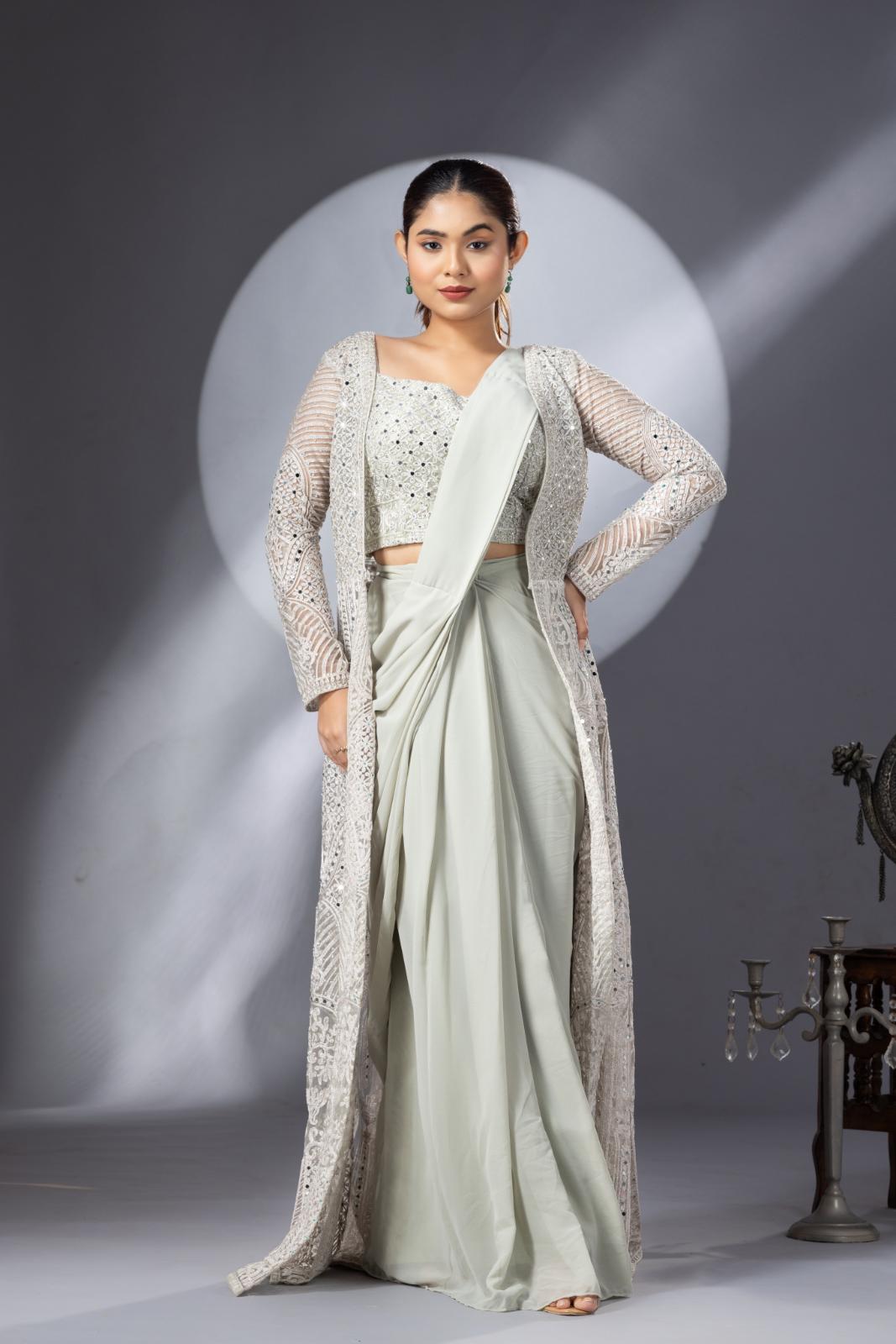 Pastel Green Draped Saree with Heavy Embroidered Shrug & Blouse