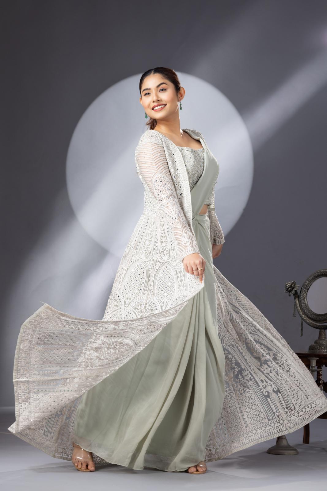 Pastel Green Draped Saree with Heavy Embroidered Shrug & Blouse