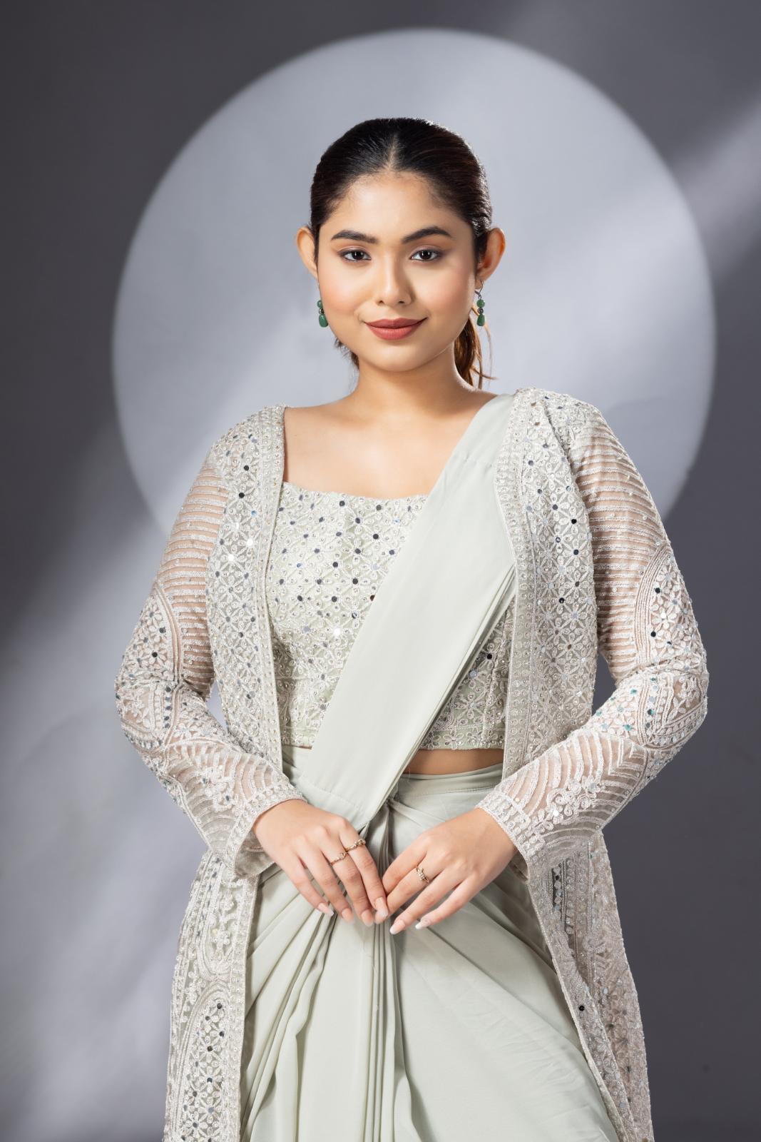 Pastel Green Draped Saree with Heavy Embroidered Shrug & Blouse