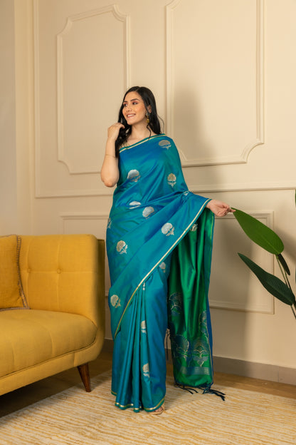 Turquoise Satin Silk With Zari Woven Buta Work.