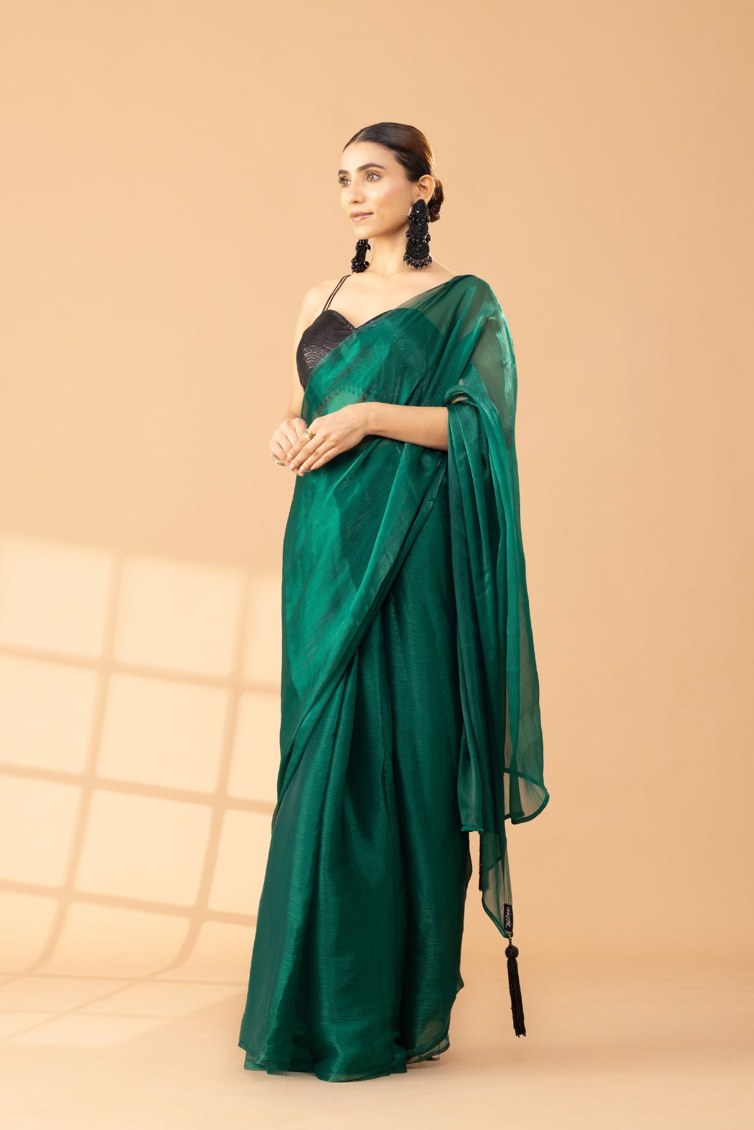Rich Emerald Green Organza Chiffon Saree With Black Tassels
