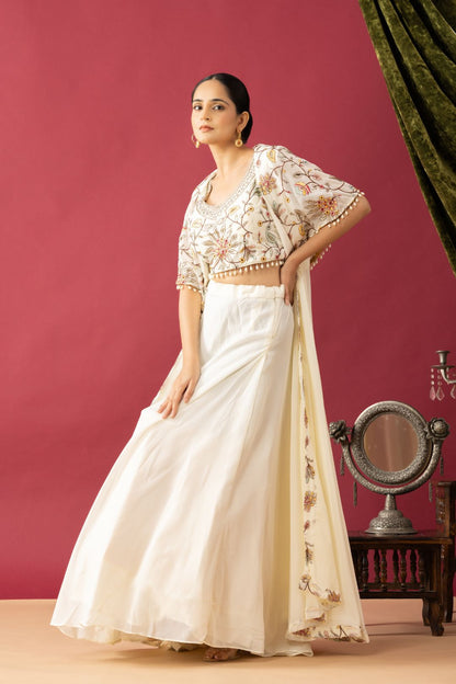 Embroidered White Lehenga set in Cape Style