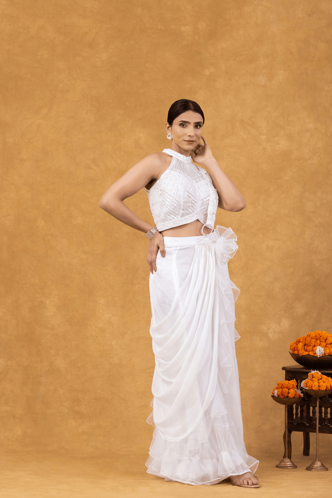Ivory Ruffle Drape Saree with Embellished Halter Blouse