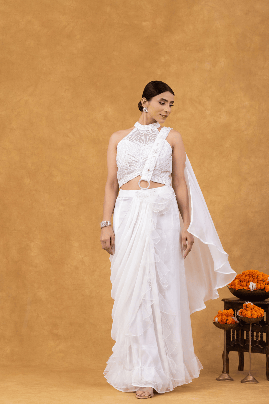 Ivory Ruffle Drape Saree with Embellished Halter Blouse