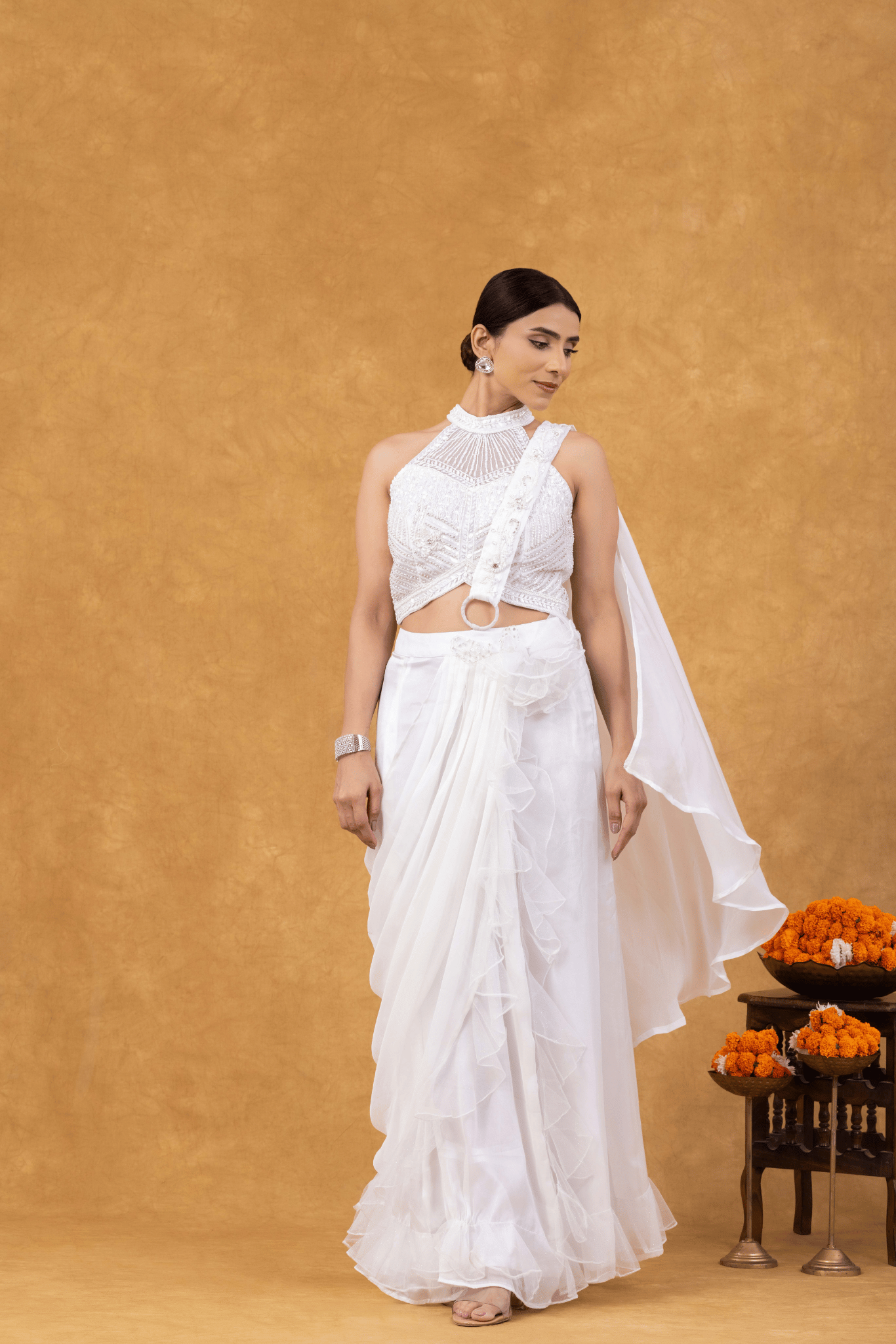 Ivory Ruffle Drape Saree with Embellished Halter Blouse