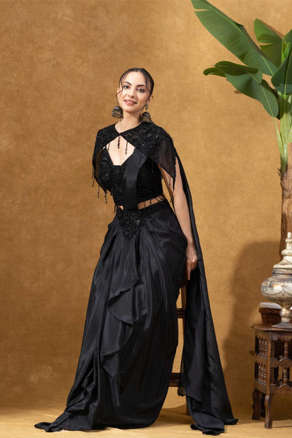 Elegant Black Saree with Statement Shoulder Cape