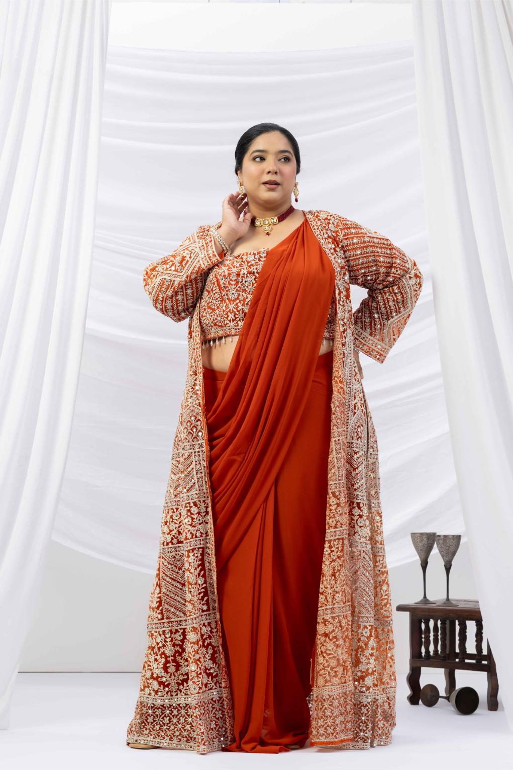 Rust Gold Draped Saree with Heavy Embroidered Shrug &amp; Blouse